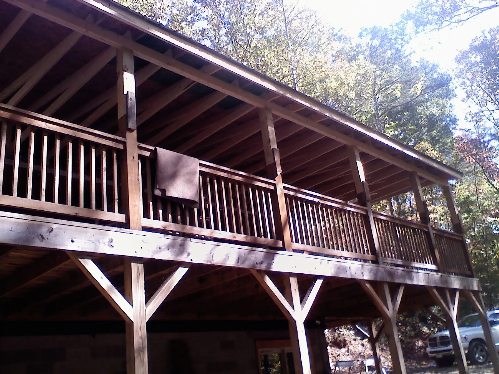 Timber framing under a new elevated porch and deck — Roof Leak Repair in East Windsor by Roofing Brothers